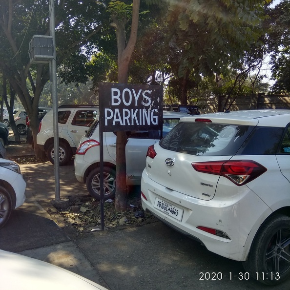 Boys parking at entrance of college.jpg